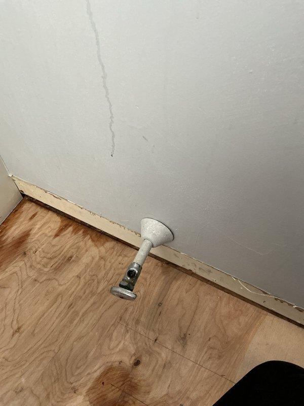 Responded to water leak service call and shut off water supply valves to the laundry area and toilet to prevent further water damage. Removed toilet to access plumbing fixtures, exposing the toilet flange and underlying drain pipe for inspection and repair. Installed furnace filter and performed air conditioning system maintenance as additional preventive service during the visit.