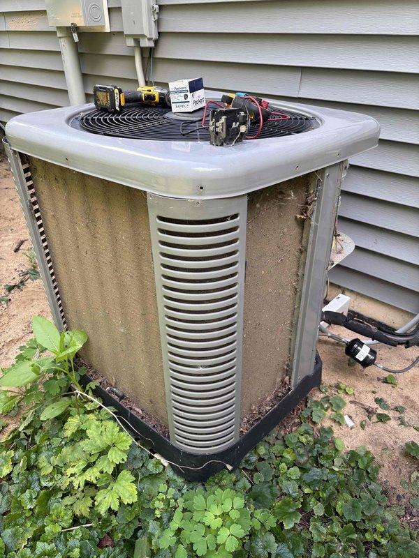 Responded to no-cooling call on 5-year-old Ruud system. Customer reported HVAC system stopped working due to clogged filter, which was cleared prior to arrival, but unit failed to restore operation after power cycling at switch and breaker. Upon arrival, performed diagnostic evaluation of outdoor condenser unit and thermostat communication. Identified underlying electrical or control board issue preventing system restart following filter blockage event. Completed troubleshooting procedures using testing equipment to isolate fault in system controls. Restored system operation and verified proper cooling function at thermostat and condenser unit.
