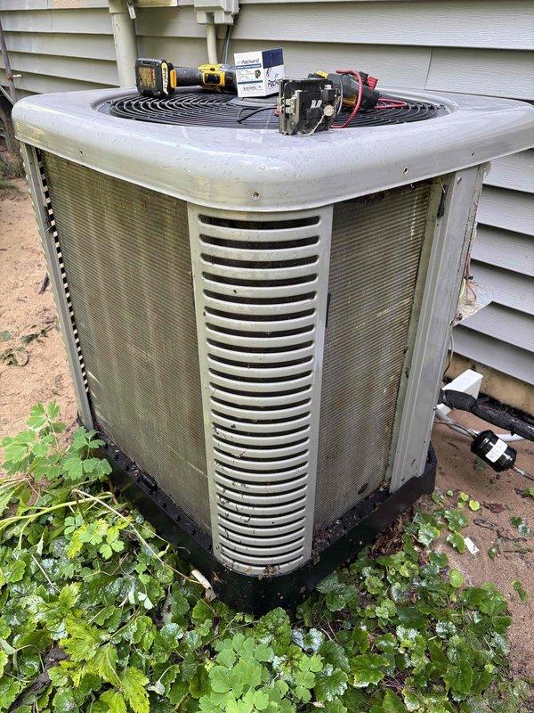 Responded to no-cooling call on 5-year-old Ruud system. Customer reported HVAC system stopped working due to clogged filter, which was cleared prior to arrival, but unit failed to restore operation after power cycling at switch and breaker. Upon arrival, performed diagnostic evaluation of outdoor condenser unit and thermostat communication. Identified underlying electrical or control board issue preventing system restart following filter blockage event. Completed troubleshooting procedures using testing equipment to isolate fault in system controls. Restored system operation and verified proper cooling function at thermostat and condenser unit.