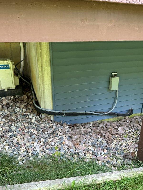 Responded to no-cooling call following previous day's tune-up service where a part replacement was completed. Upon arrival, verified unit would not start when called for cooling. Inspected exterior disconnect boxes and electrical connections at foundation level, confirmed proper conduit routing and secure mounting of both disconnect panels. Troubleshot starting circuit, identified and resolved issue preventing compressor engagement. Tested system operation through complete cooling cycle, verified proper startup sequence and confirmed unit now operating normally per manufacturer specifications.