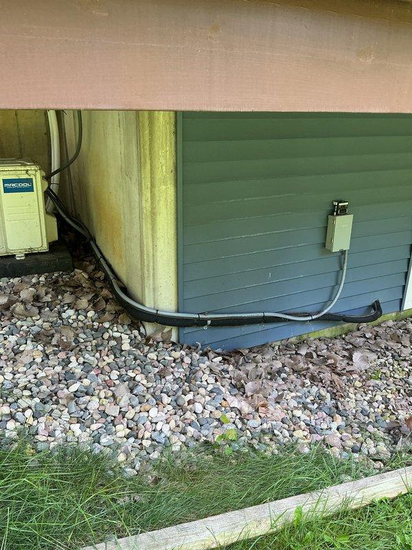 Responded to no-cooling call following previous day's tune-up service where a part replacement was completed. Upon arrival, verified unit would not start when called for cooling. Inspected exterior disconnect boxes and electrical connections at foundation level, confirmed proper conduit routing and secure mounting of both disconnect panels. Troubleshot starting circuit, identified and resolved issue preventing compressor engagement. Tested system operation through complete cooling cycle, verified proper startup sequence and confirmed unit now operating normally per manufacturer specifications.