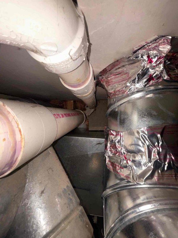 Responded to service call for Bradford White water heater that was flooded following bathroom tub replacement. Performed thorough inspection of unit and all plumbing connections after homeowner had removed standing water from area. Upon examination, verified water heater operation, checked for internal damage, inspected venting system, and tested all safety controls to ensure unit was functioning properly and safe for continued use.