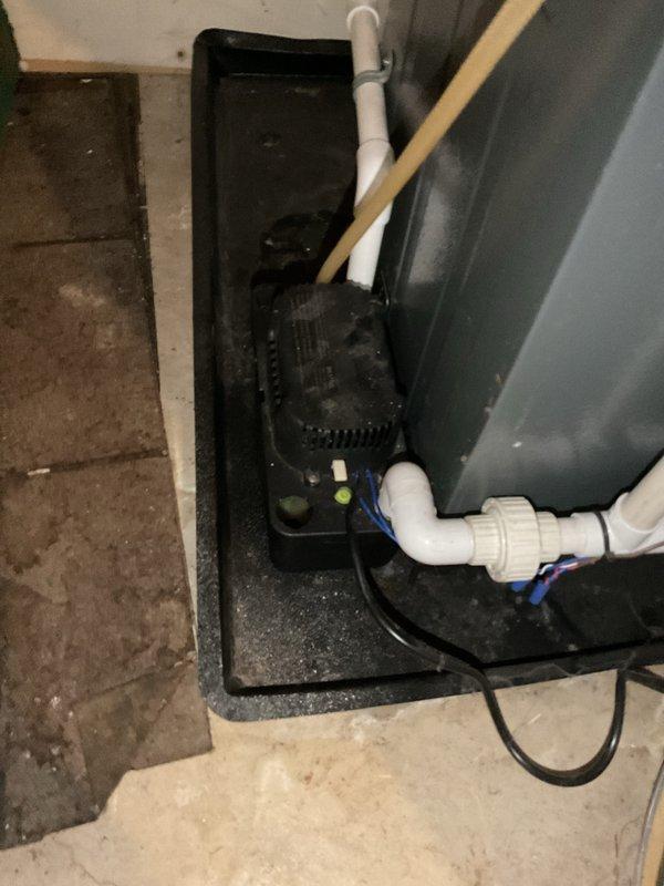 Completed annual cooling maintenance on a 12-year-old EnergiAir system (2014 model). Performed standard tune-up procedures including system inspection, operational testing, and safety verification. Documented existing sump pump installation and confirmed carbon monoxide detector functionality during routine safety assessment.