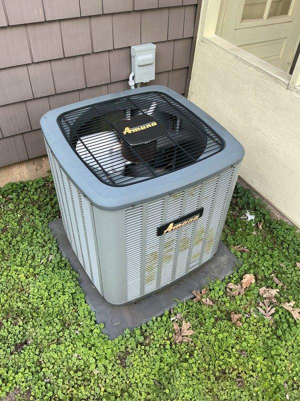 Responded to no-cool condition on 8-year-old Amana air conditioning system. Upon arrival, inspected outdoor condenser unit and traced electrical supply to aging fuse panel in basement. Found blown fuse in obsolete fuse box serving the AC circuit. Replaced failed fuse and verified proper amperage rating. Tested system operation and confirmed condenser and air handler are now functioning normally with adequate cooling restored.