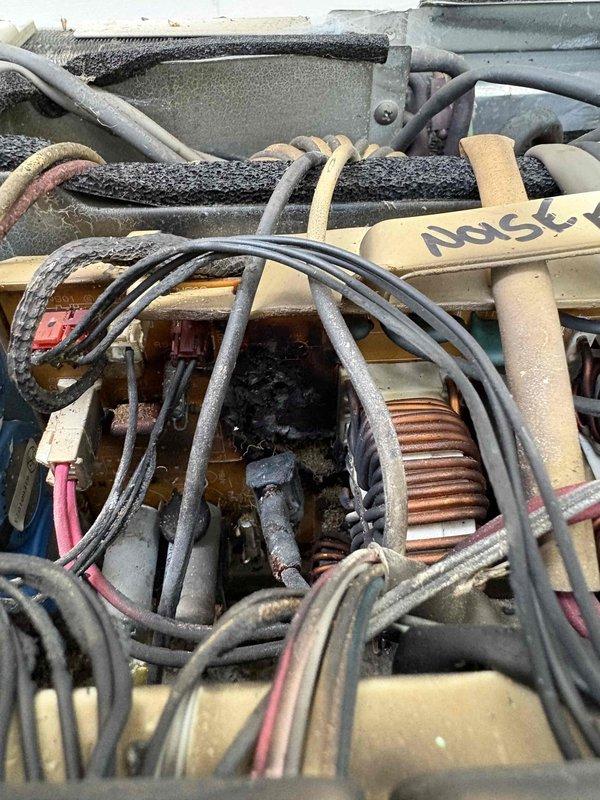 Responded to a 20-year-old Mitsubishi mini-split system experiencing a blinking green light error code and automatic shutdown after 5-10 minutes of operation. Upon inspection, accessed the outdoor unit's electrical compartment and identified failed capacitor and deteriorated wiring connections contributing to the malfunction. Replaced the defective blue run capacitor, cleaned and secured all electrical connections within the junction box, and tested system operation to confirm proper startup sequence and continuous run cycle without error codes. Presented maintenance agreement options for ongoing system care, successfully enrolling the customer in furnace, air conditioning, and humidifier coverage plans.