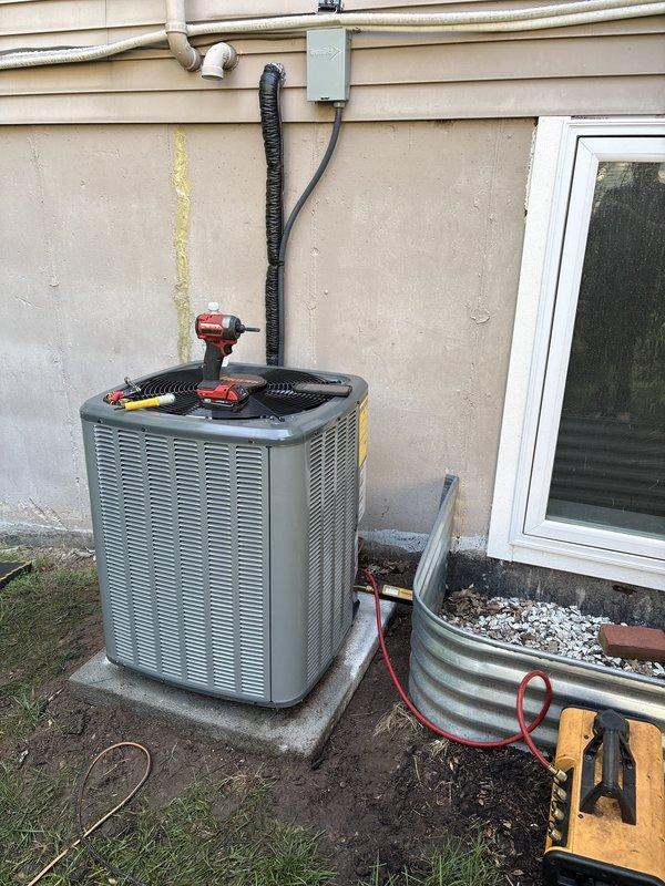 Performed no-charge assessment and maintenance on residential HVAC system, including rotation of outdoor AC condenser unit to optimize airflow and clearances. Inspected refrigerant lines, electrical connections, and disconnect box to ensure proper installation and operation. Addressed homeowner concerns regarding system performance and documented current equipment condition with photographs for service records.