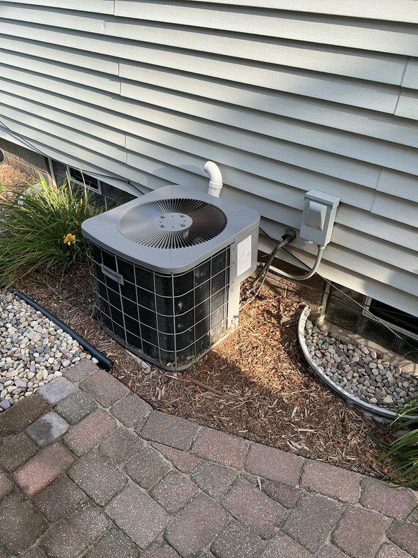 Performed comprehensive assessment of existing residential air conditioning system including outdoor condenser unit and indoor air handler. System currently operational but showing signs of age and wear with potential reliability concerns. Evaluated equipment condition, ductwork configuration, and installation setup to provide estimate for full system replacement and potential ductless mini-split installation as alternative or supplemental cooling solution.