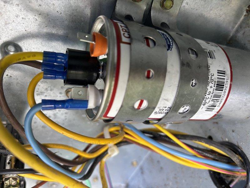 Responded to no-cool service call where outdoor unit failed to operate while indoor blower continued running. Diagnosed failed dual run capacitor in outdoor condensing unit serving approximately 10-year-old air conditioning system. Replaced defective capacitor with properly rated replacement, restoring normal compressor and condenser fan operation and full cooling functionality to the home.