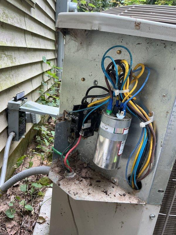 Completed annual cooling system maintenance on 7-year-old EcoAir unit. Performed comprehensive tune-up including inspection of outdoor disconnect box, electrical contactor, and capacitor connections. All wire terminations verified secure with proper bundling. Inspected condensate pump installation in attic space, confirmed proper operation and drainage. System tested and operating within normal parameters for continued reliable cooling performance.