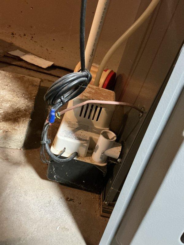 Completed annual cooling system maintenance on 7-year-old EcoAir unit. Performed comprehensive tune-up including inspection of outdoor disconnect box, electrical contactor, and capacitor connections. All wire terminations verified secure with proper bundling. Inspected condensate pump installation in attic space, confirmed proper operation and drainage. System tested and operating within normal parameters for continued reliable cooling performance.