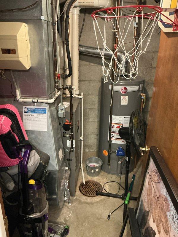 Completed annual cooling maintenance on 21-year-old Lennox system. Advised homeowner regarding humidifier operation due to slow-draining floor drain in basement utility area that backs up when excessive water is introduced. Documented equipment condition and drainage concern with photos for reference.