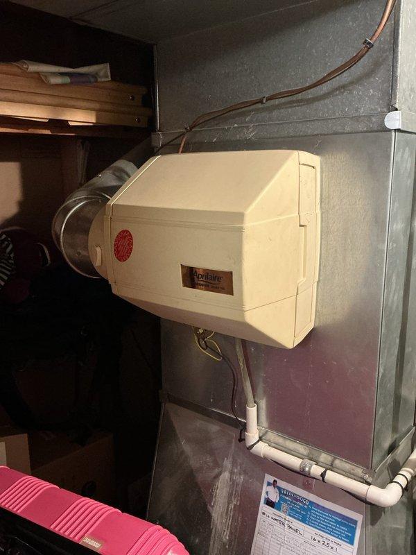 Completed annual cooling maintenance on 21-year-old Lennox system. Advised homeowner regarding humidifier operation due to slow-draining floor drain in basement utility area that backs up when excessive water is introduced. Documented equipment condition and drainage concern with photos for reference.
