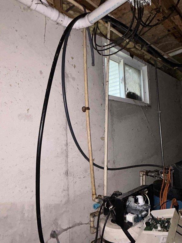 Responded to running toilet complaint in 24-year-old residential property. Upon inspection, identified faulty fill valve causing continuous water flow. Replaced worn fill valve assembly and adjusted float mechanism to proper water level. Tested flush cycle multiple times to confirm proper operation and verify no leakage. Performed water quality testing using standard iron and pH analysis kit to rule out mineral buildup or corrosion issues affecting valve performance. Inspected basement plumbing infrastructure including supply lines and shutoff valves for any additional concerns. Toilet now operating normally with complete shutoff after flush cycle.