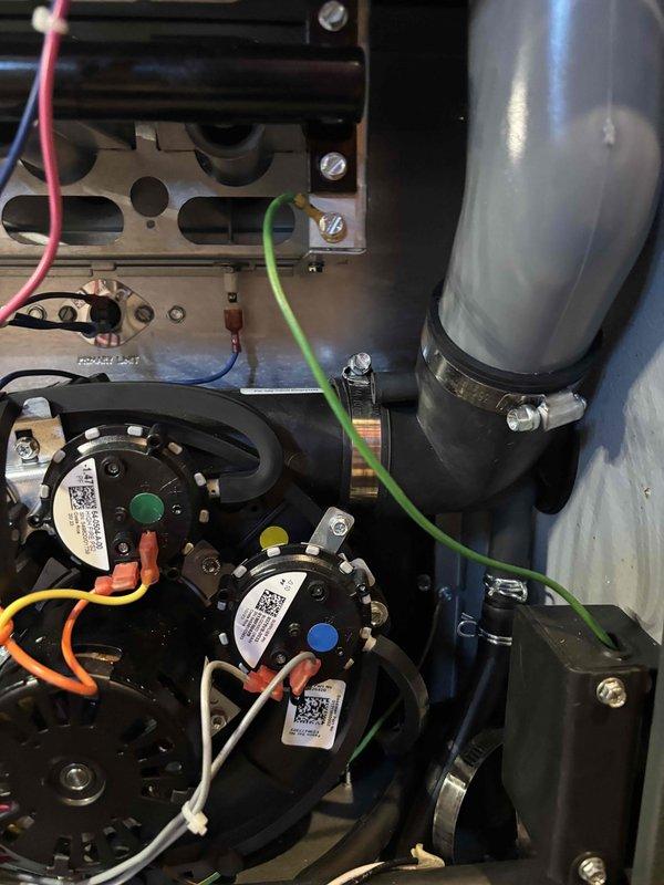 Completed annual heating maintenance on furnace system. Performed comprehensive tune-up including inspection of all mechanical and electrical components, pressure switches, safety controls, and wiring connections. Verified proper operation of all systems, checked electrical connections at terminal blocks, and inspected blower assembly and ductwork. All components found operating within normal parameters. System is in good working condition with warranty coverage extending through September 2033.