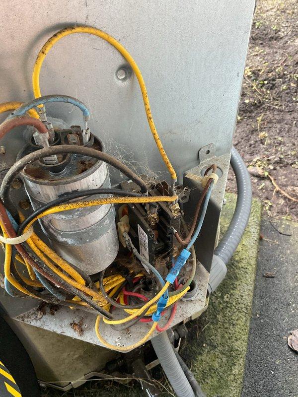 Completed furnace and air conditioning tune-up on 25+ year old HVAC system at residential property. Performed comprehensive inspection of both heating and cooling equipment, documenting significant rust, corrosion, and weathering on outdoor AC unit components including capacitors, electrical connections, and internal wiring. Provided replacement equipment quote due to age and deteriorating condition of existing units.