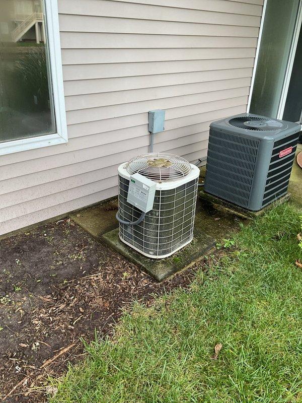 Completed furnace and air conditioning tune-up on 25+ year old HVAC system at residential property. Performed comprehensive inspection of both heating and cooling equipment, documenting significant rust, corrosion, and weathering on outdoor AC unit components including capacitors, electrical connections, and internal wiring. Provided replacement equipment quote due to age and deteriorating condition of existing units.