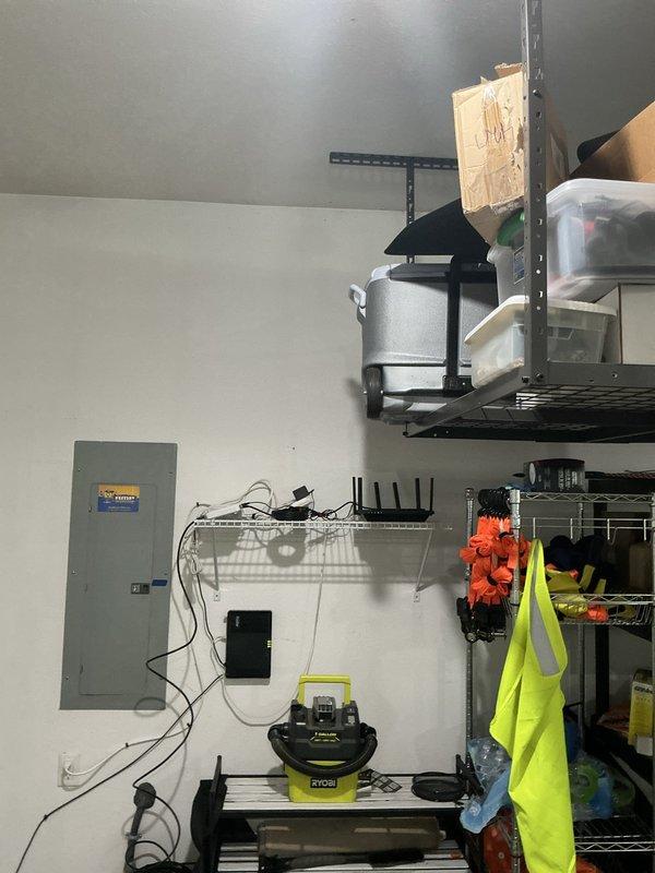 Conducted on-site assessment for heat pump installation in garage space. Evaluated existing electrical infrastructure including main distribution panel and current capacity to determine requirements for heat pump system integration. Documented garage layout, available wall space, and utility connections to develop comprehensive heating solution estimate for the detached or semi-finished garage area.