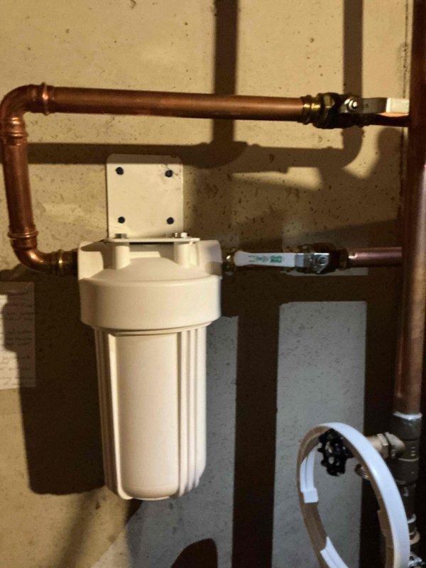 Provided customer education and training on whole home water filtration system maintenance following initial installation in March. Demonstrated proper filter replacement procedure, identified filter housing location and removal process, and provided guidance on where to purchase replacement filters. Verified system operation and ensured customer was comfortable with ongoing maintenance requirements.