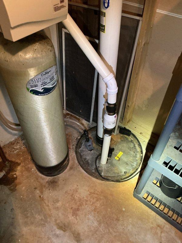 Completed estimate for whole-home water heater replacement and water softener system upgrade in a 30-year-old residence. Assessed existing A.O. Smith water heater, water softener with control head, pressure tank, and associated plumbing infrastructure in basement utility area. Provided recommendations for modernizing the complete water treatment and heating system to improve efficiency and performance.