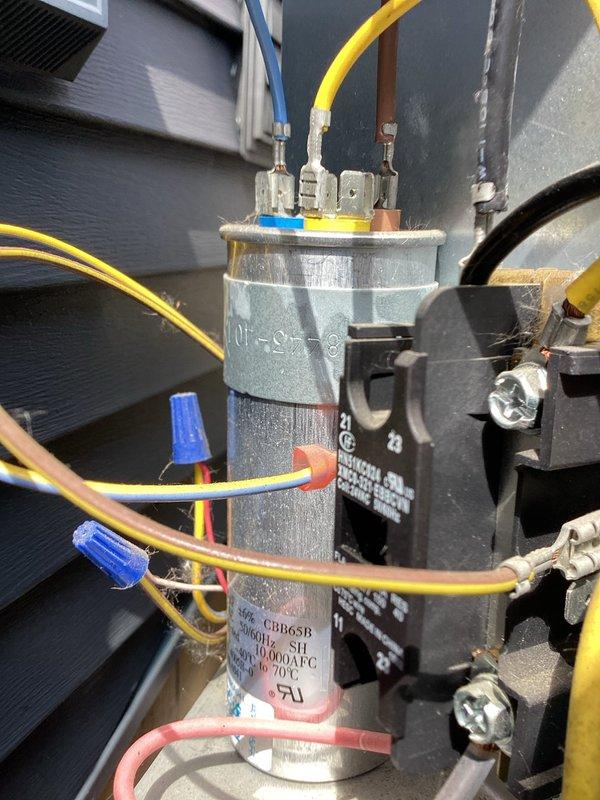 Completed annual heating and cooling maintenance on 6-year-old Carrier furnace and air conditioning system. Performed comprehensive tune-up including inspection of electrical components, capacitor, contactor, and wiring connections in outdoor unit. All components found to be in proper working condition with secure connections and appropriate wire management. System tested and operating within normal parameters.