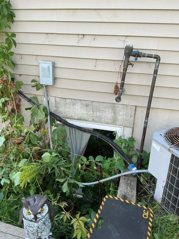 # CP-Cooling Problem Resolution

Responded to service call for 27-year-old air conditioning system that failed to start. Upon arrival, performed diagnostic evaluation of outdoor condensing unit located against exterior wall. Unit exhibited signs of age and deferred maintenance, with significant rust corrosion visible on refrigerant lines and weathered components. Vegetation overgrowth around unit base was noted, potentially restricting airflow to condenser.

Conducted electrical troubleshooting to identify cause of no-start condition. Inspected disconnect, contactor, capacitor, and control wiring for failures. Verified power supply to unit and tested all electrical components for proper operation. Cleared debris and vegetation from around unit perimeter to restore adequate ventilation clearance. 

System was successfully restored to operational status. Advised customer of unit's advanced age and deteriorated condition of refrigerant piping, recommending consideration for system replace