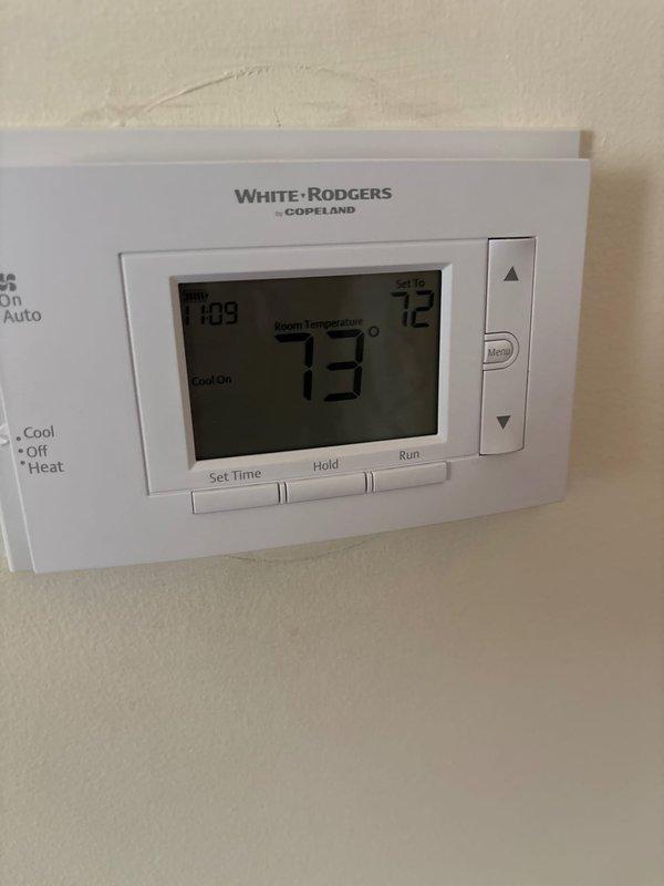 Responded to service call for White-Rodgers thermostat not maintaining set temperature on 9-year-old Lennox system. Upon arrival, verified thermostat was displaying current room temperature of 78°F but requiring manual resets to maintain cooling operation. Inspected thermostat operation, checked wiring connections, and tested system cycling. Thermostat displaying proper readings and responding to temperature adjustments during diagnostic testing. Documented equipment condition with photos showing digital display and control functions operational at time of service.