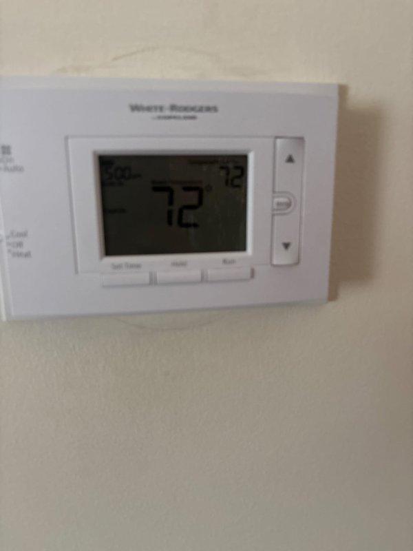 Responded to service call for White-Rodgers thermostat not maintaining set temperature on 9-year-old Lennox system. Upon arrival, verified thermostat was displaying current room temperature of 78°F but requiring manual resets to maintain cooling operation. Inspected thermostat operation, checked wiring connections, and tested system cycling. Thermostat displaying proper readings and responding to temperature adjustments during diagnostic testing. Documented equipment condition with photos showing digital display and control functions operational at time of service.