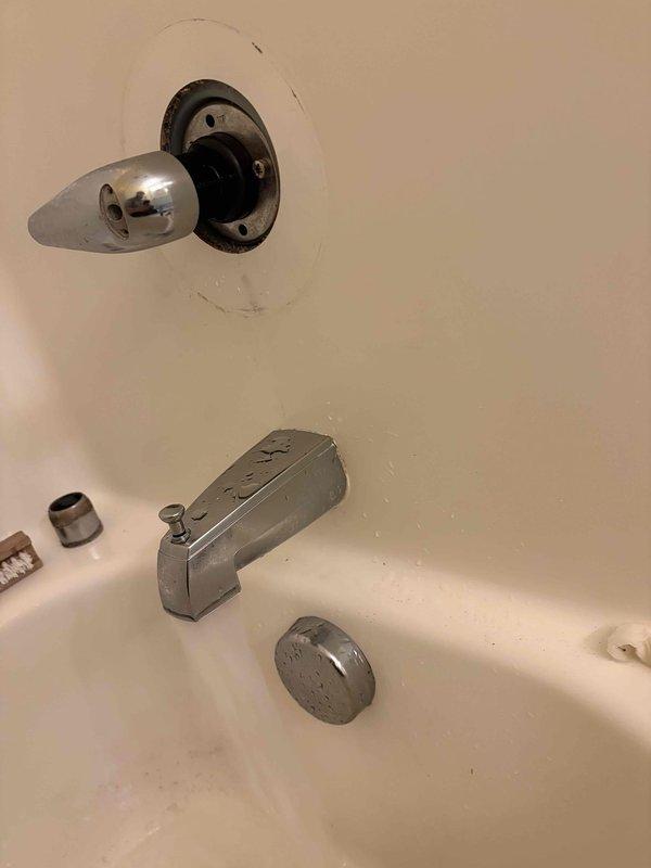 # PRSUMP - Sump Pump Problem

Responded to service call for sump backing up issue. Upon arrival and inspection, determined the problem was actually related to bathtub plumbing fixtures rather than a sump pump system. Removed and disassembled chrome bathtub spout, escutcheon plate, and associated pipe adapters to address drainage concerns. Completed necessary repairs to resolve the backup issue and restored proper water flow through the tub drain and plumbing system.