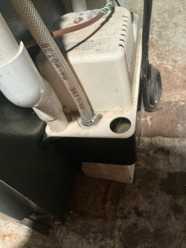 Completed annual heating and cooling maintenance on 13-year-old EnergiAir furnace and air conditioning system. Performed comprehensive tune-up procedures including inspection of HVAC condensate pump system, verified proper operation of drainage components and PVC discharge piping, and documented equipment condition with photos for service records.