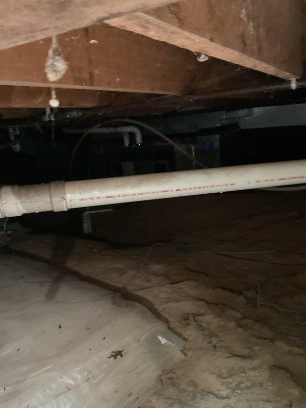 Responded to service call for Bosch Aquastar tankless water heater with pilot light failure. Upon arrival, accessed unit located in crawlspace area beneath residence. Inspected tankless water heater system and diagnosed faulty flame sensor preventing pilot from remaining lit. Due to age of unit and unavailability of replacement parts for this older Bosch Aquastar model, recommended replacement of entire tankless water heater system. Customer declined replacement at this time and opted to explore options independently.