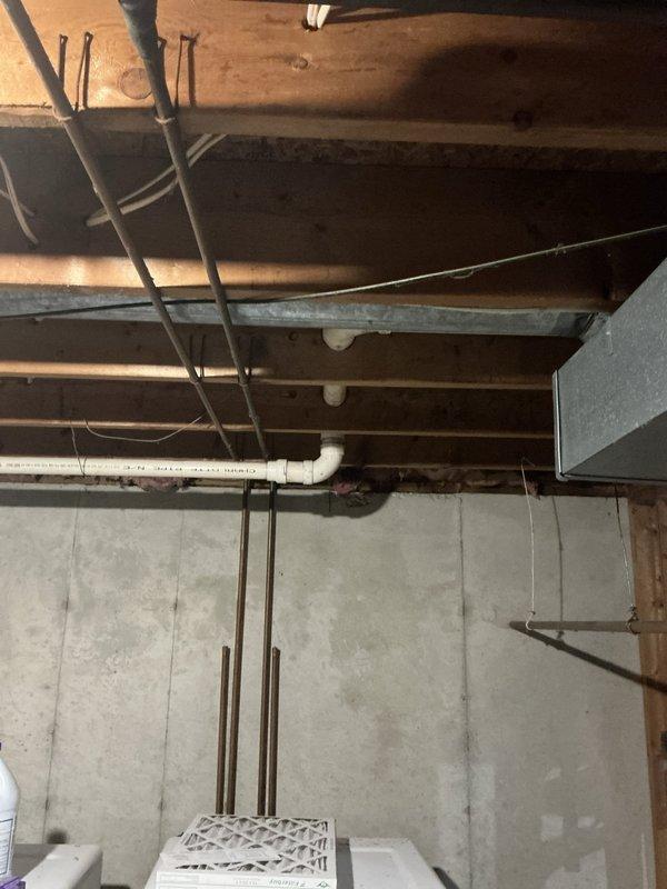 Conducted comprehensive estimate for furnace and air conditioning system installation in a 1988-built home requiring new AC addition. Assessed unfinished basement area with exposed mechanical systems, including existing electrical panel with available capacity for HVAC equipment, copper plumbing lines, and ductwork infrastructure. Evaluated electrical service panel for proper circuit availability and load calculations necessary for new equipment installation. Documented existing mechanical ceiling layout including copper piping, PVC drainage systems, and galvanized ductwork to determine optimal placement for new furnace and air conditioning components. Identified suitable installation location with adequate clearances and access to existing utility connections for efficient system integration.