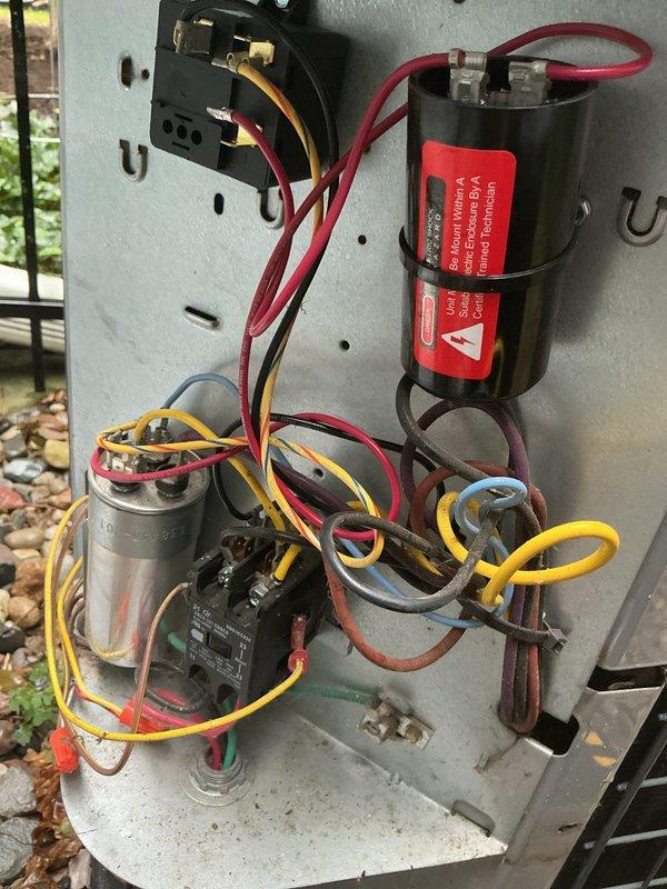 Installed a 5-2-1 compressor hard start kit on an outdoor HVAC unit to improve compressor starting performance and reduce electrical stress on the system. The installation involved mounting the start capacitor assembly and integrating it with the existing dual-run capacitor and compressor circuit wiring. All electrical connections were properly terminated and secured, and the unit was tested for proper operation.