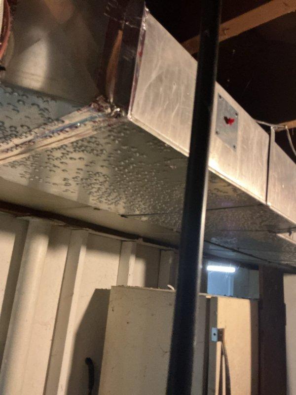 Responded to no-cooling call on 3-year-old EnergiAir system where thermostat indicated cooling mode but outdoor unit was not operating. Found wet switch safety device activated at furnace, indicating condensate drain blockage. Cleared condensate line obstruction, reset safety switch, verified proper drainage, and confirmed system returned to normal cooling operation with outdoor unit running and proper airflow restored.