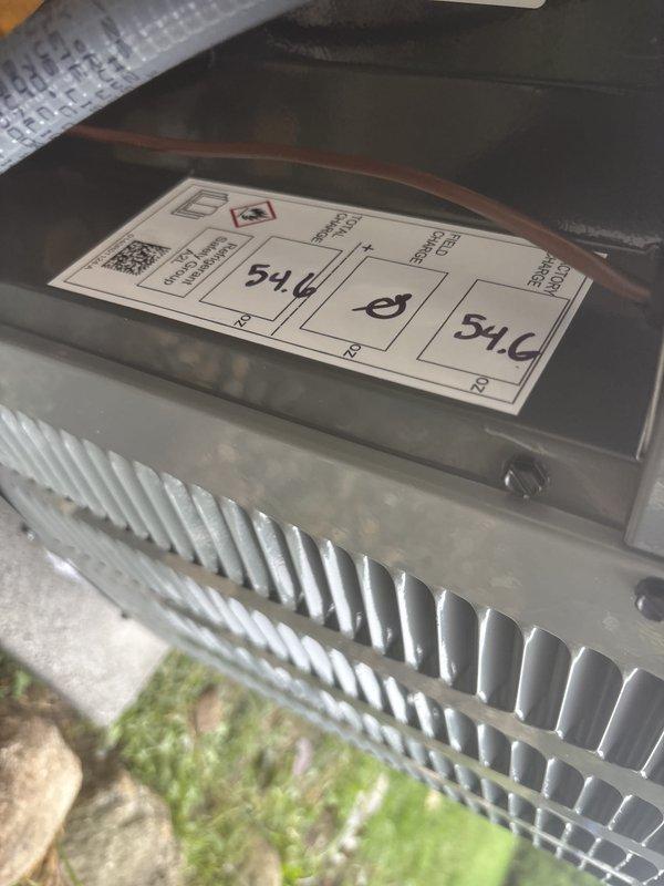 Completed full AC system replacement including outdoor condenser unit and indoor air handler. Installed new gray condenser unit on concrete pad with proper refrigerant line connections and electrical disconnect. Mounted indoor air handler with heat exchanger in crawlspace area. Established all refrigerant piping, condensate drainage via PVC, and electrical connections per manufacturer specifications. System tested and operational upon completion. Documentation photos captured for record-keeping purposes.
