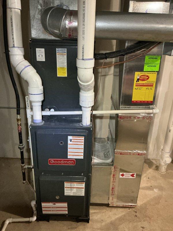 Responded to repeat service call for water heater not heating. Upon arrival, inspected white cylindrical residential water heater in basement utility area. Verified electrical connections at top of unit, including red and black wiring to wall-mounted switch box. Checked copper supply lines and white PVC venting system for proper installation and function. Diagnosed heating element failure consistent with previous service visit approximately five weeks prior. Replaced defective heating element and tested thermostat operation. Verified proper voltage supply to unit and confirmed all electrical connections secure. Cycled unit through complete heating cycle and verified hot water production. System restored to full operational status.