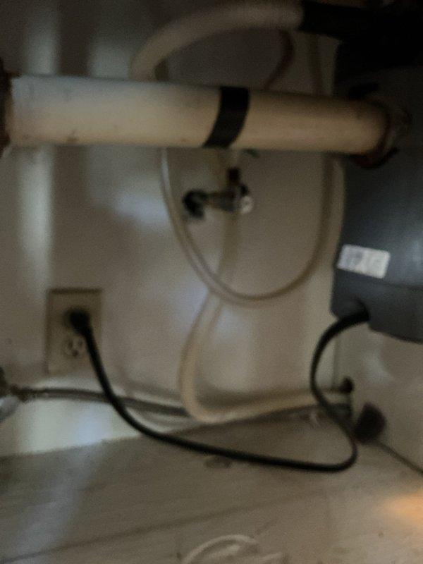 Responded to a sink plumbing issue where the drain assembly required attention. Upon inspection, removed and examined the existing drain components including the strainer basket and tailpiece connections located beneath the kitchen sink cabinet. Cleaned the cabinet base surface of debris and residue, then reinstalled or replaced the chrome drain fittings and associated hardware to restore proper function and ensure a watertight seal.