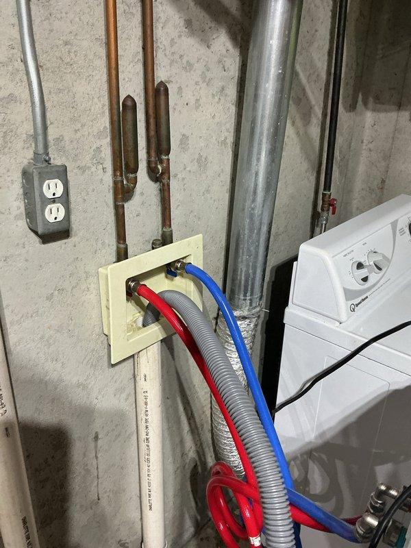 Replaced washing machine cold water supply hose with customer-provided hose at basement laundry connection point. Shower drain replacement on fiberglass unit was addressed as requested to resolve drainage issue.