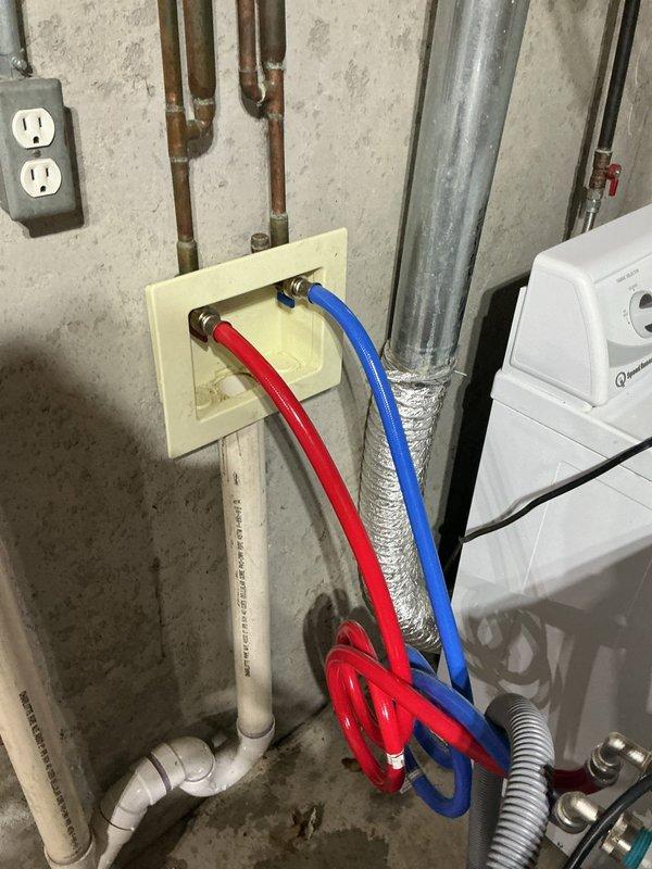 Replaced washing machine cold water supply hose with customer-provided hose at basement laundry connection point. Shower drain replacement on fiberglass unit was addressed as requested to resolve drainage issue.