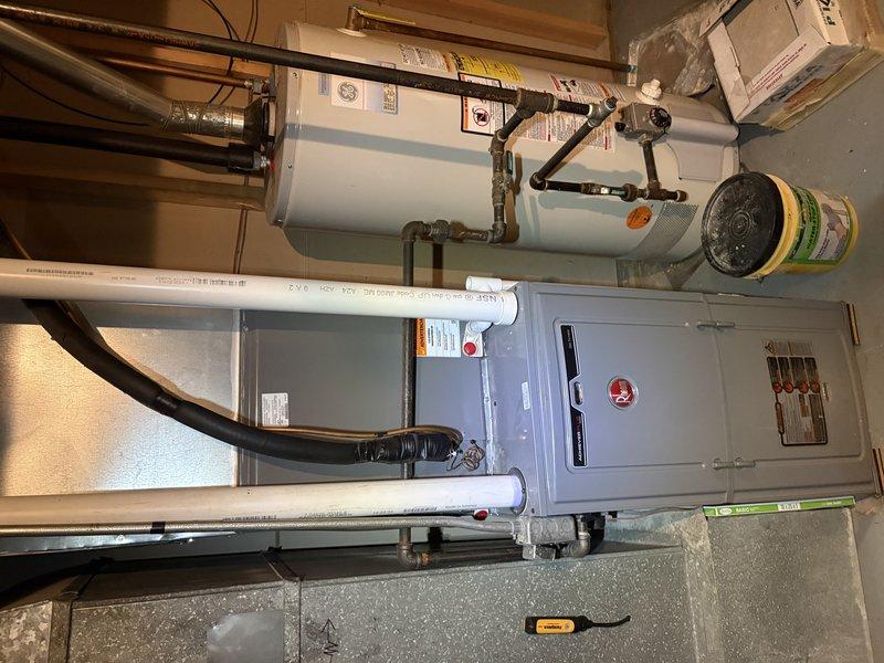 Responded to no cooling complaint on residential HVAC system. Upon inspection, found electrical disconnect box with blown fuses due to severe contamination from dirt, debris, and cobwebs causing poor electrical connection and overheating. Replaced both fuses, cleaned electrical connections and disconnect assembly, verified proper voltage and amperage at unit. System restored to normal operation with cooling confirmed.