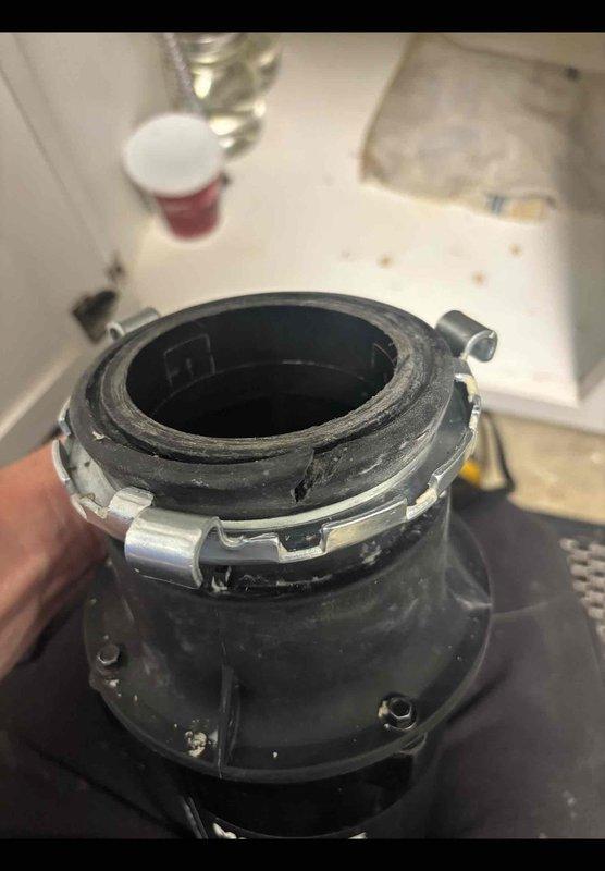 Responded to disposal replacement call where homeowner had unsuccessfully attempted installation. Removed old disposal unit and mounting assembly from under kitchen sink. Successfully installed replacement disposal unit, connected drain lines and dishwasher discharge hose, verified proper mounting and seal integrity, tested unit operation and checked for leaks. System functioning properly upon completion.