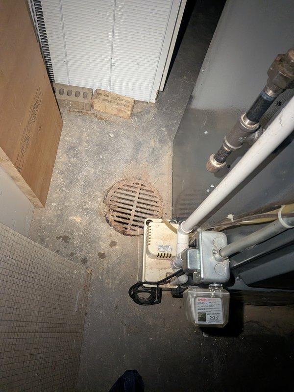 Responded to service call for unfamiliar noise coming from 22-year-old Amana furnace that had not been serviced in approximately one year. Upon arrival, performed comprehensive system inspection and diagnostic evaluation of the heating unit. Conducted visual examination of all accessible components including blower assembly, heat exchanger, burner compartment, and motor bearings to identify source of abnormal sound. Checked electrical connections, gas valve operation, and flame sensor condition. Inspected ductwork connections and verified proper airflow throughout the system. Evaluated inducer motor and wheel for debris accumulation or wear that could cause unusual operational sounds. Tested system through complete heating cycle while monitoring for noise patterns and irregularities. Documented current condition of aging equipment with photographic evidence of installation and surrounding utility area. System found to be operational despite age-related wear concerns typical of units ex