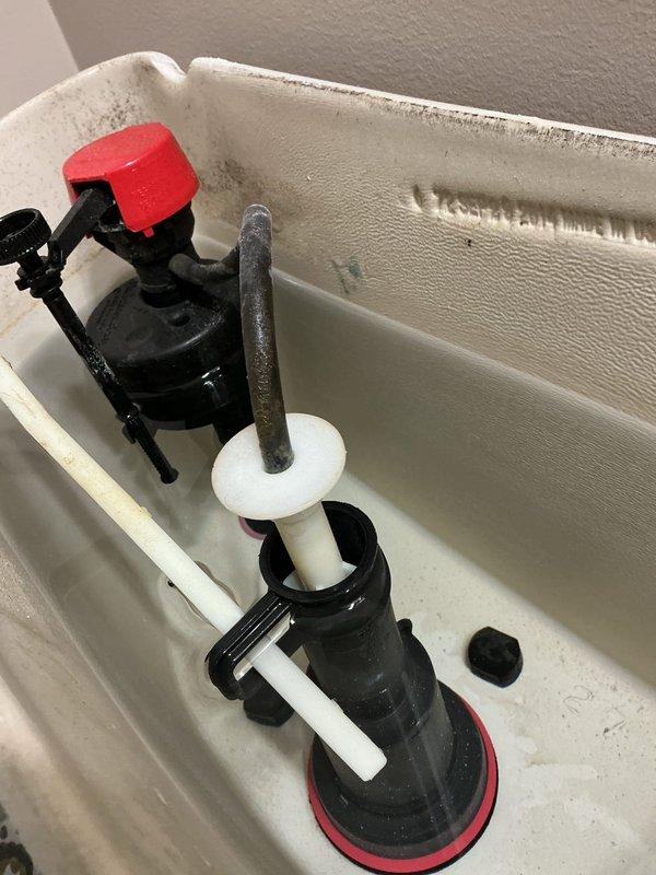 Performed on-site inspection and diagnostic assessment of two toilets requiring replacement. Primary issue identified: one toilet experiencing continuous running condition due to failed internal tank components. Documented existing conditions through photographic evidence showing deteriorated fill valve assembly, compromised flush valve mechanism with worn rubber seals, and significant mineral buildup throughout tank interiors. Observed excessive water staining, sediment accumulation, and aging components indicating end of service life for both fixtures. Provided comprehensive estimate for complete toilet replacement to resolve operational issues and restore proper water efficiency.