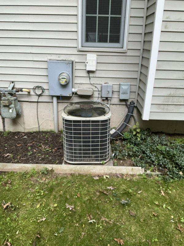 Conducted comprehensive on-site evaluation for complete HVAC system replacement of 16-year-old furnace and air conditioning unit. Inspected existing outdoor condenser unit, assessed ductwork configuration in attic space including metallic rigid and flexible aluminum ducting components, documented current system specifications, electrical service connections, and gas line installations. Provided detailed equipment replacement recommendations and sizing calculations for new furnace and AC system installation.