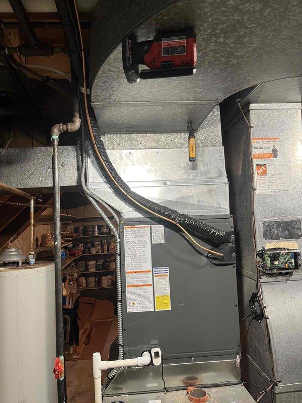 Completed full ACREP-AC system installation including outdoor condenser unit and indoor air handler components. Installed new condenser on concrete pad with proper electrical disconnect and conduit routing, positioned unit for optimal airflow with adequate clearance from building structure. Inside mechanical room, installed new air handler with integrated evaporator coil, connected to existing ductwork using flexible and rigid metallic transitions. Established refrigerant line sets between indoor and outdoor units, performed vacuum test, and charged system to manufacturer specifications. Completed all electrical connections including power supply from disconnect box to condenser and air handler wiring. Verified proper drainage from condensate system. System startup performed successfully with all safety controls operational and airflow balanced throughout distribution system.