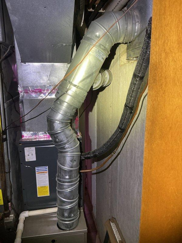 Responded to condominium for water heater replacement estimate on existing tank-style unit of unknown age. Accessed equipment in basement utility area with laundry facilities and HVAC system. Assessed current installation, documented existing conditions including water heater location, venting configuration, and surrounding mechanical systems. Provided estimate for replacement with new water heater including removal and disposal of old unit, installation of new equipment with proper venting and code-compliant connections.