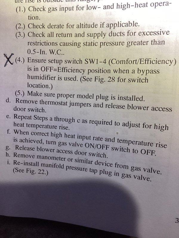 Completed annual cooling maintenance on Carrier system per 3-year tune-up agreement. Verified furnace setup switch SW1-4 (Comfort/Efficiency) was properly positioned in OFF=Efficiency mode for bypass humidifier operation, inspected HVAC equipment and water heater installation in mechanical room, and documented system configuration with photos for service records.