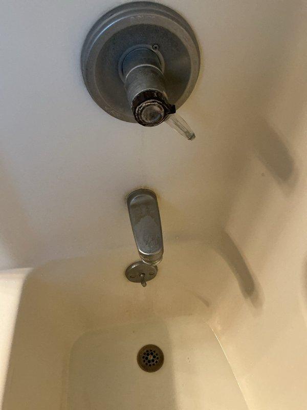 Responded to service call for leaky tub drain. Upon inspection, assessed all visible plumbing fixtures including shower arm assembly, tub spout with diverter, and drain cover. Completed necessary repairs to resolve the leak issue and restored proper drainage function. Documented existing fixture conditions and verified all components were operating correctly upon completion.