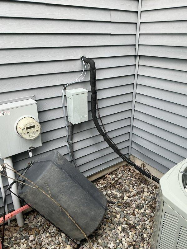 Conducted on-site assessment for dehumidifier and Energy Recovery Ventilator (ERV) installation at residential property. Evaluated existing exterior utility infrastructure including electrical service panel, meter location, and available mounting space on vinyl-sided exterior wall to determine optimal equipment placement and integration requirements for proposed indoor air quality system upgrade.