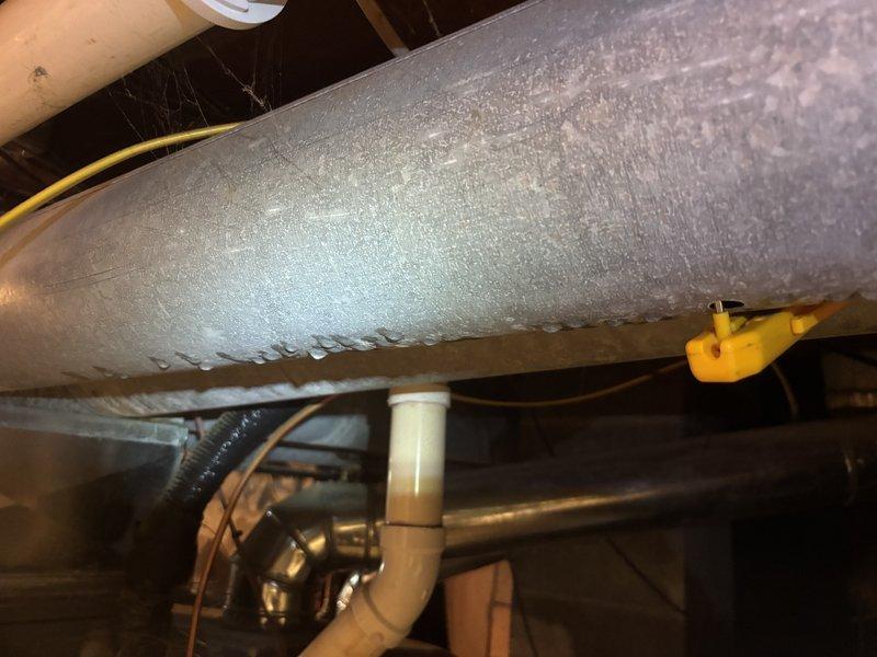 Completed annual heating and cooling system tune-up on EnergiAir equipment with warranties extending to May 2032. Performed comprehensive inspection of furnace and air conditioning systems, including examination of ductwork in attic space showing age-related insulation degradation with exposed fibrous material along seams. Inspected copper refrigerant lines, condensate pump assembly, and PVC drainage components for proper operation. Verified all mechanical connections, electrical wiring, and system controls functioning within manufacturer specifications. Updated customer contact information and documented equipment condition with photographic records for maintenance history.