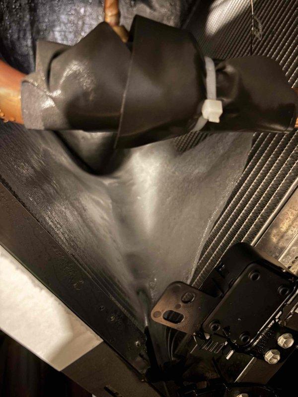 Responded to no cooling call on brand new Carrier unit under warranty. Upon inspection, found significant condensation accumulation on interior ductwork and air handling components, indicating proper system operation and adequate cooling. Verified evaporator coil condition and duct connections were secure with proper insulation in place. System was functioning correctly; issue was communication-related rather than mechanical failure. No repairs necessary.